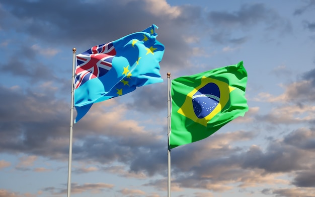 Beautiful national state flags of Tuvalu and Brasil together on blue sky