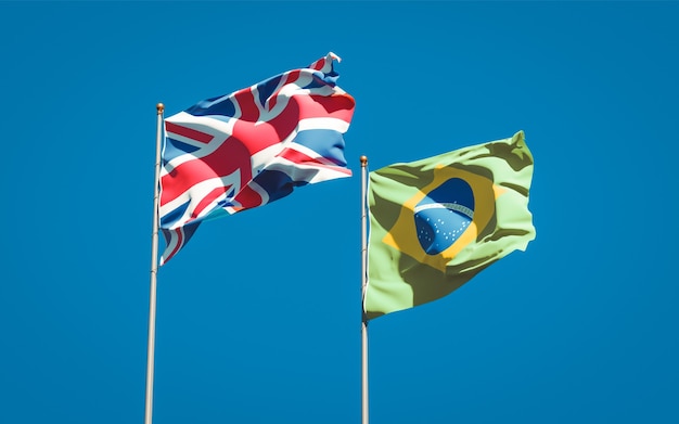 Beautiful national state flags of UK and Brasil together on blue sky