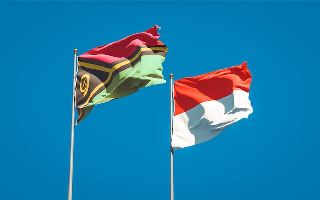 Beautiful national state flags of Vanuatu and Indonesia together on blue sky