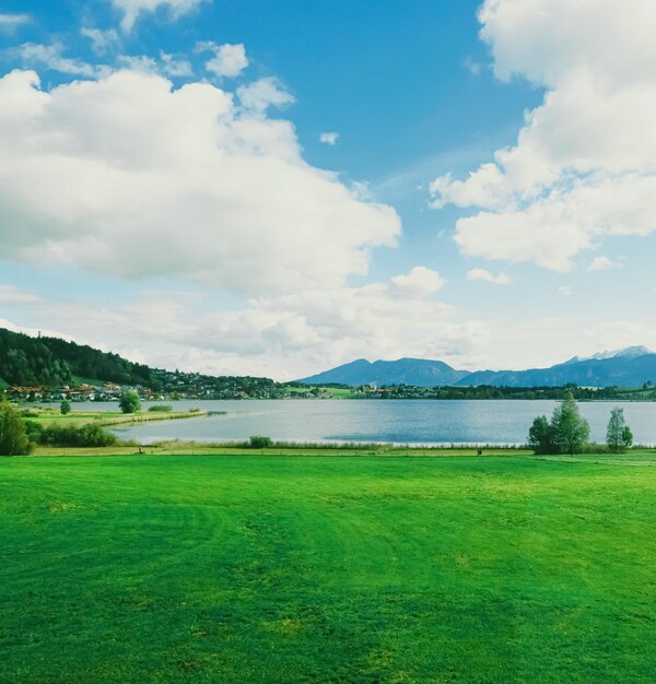 Beautiful nature of european alps landscape view of alpine mountains lake and village in spring season travel and destination