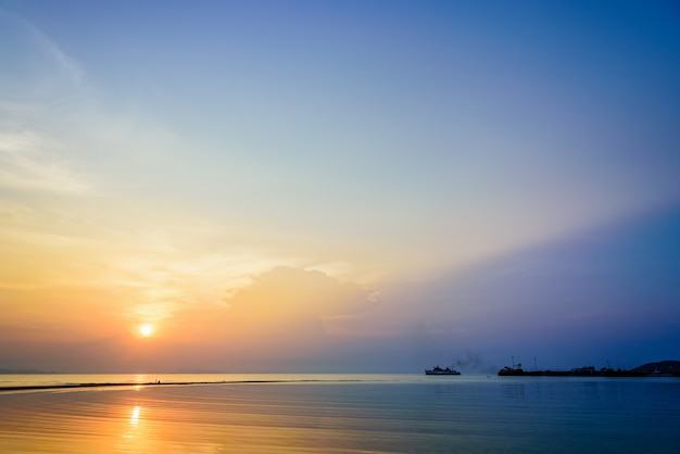 Beautiful nature landscape of Nathon Pier and boat on the sea. And colorful of the sunset sky at Nathon Beach Viewpoint, Ko Samui island, Surat Thani, Thailand