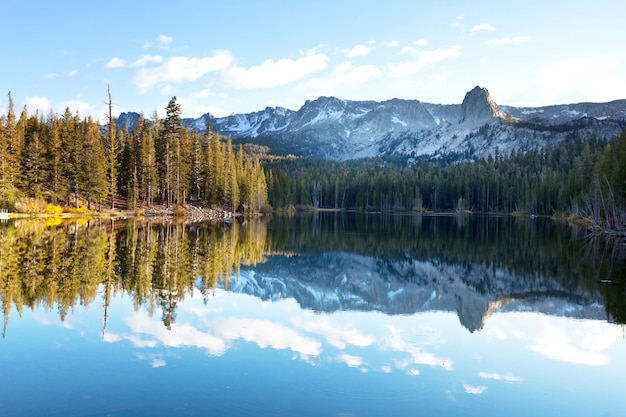 Beautiful nature scene in autumn mountains. Sierra Nevada lake reflection.