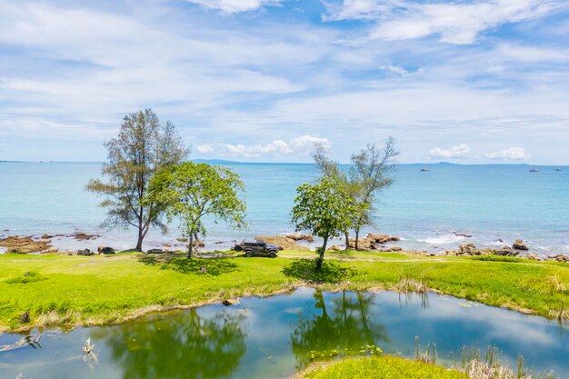 Beautiful off road car pass through tropical beach