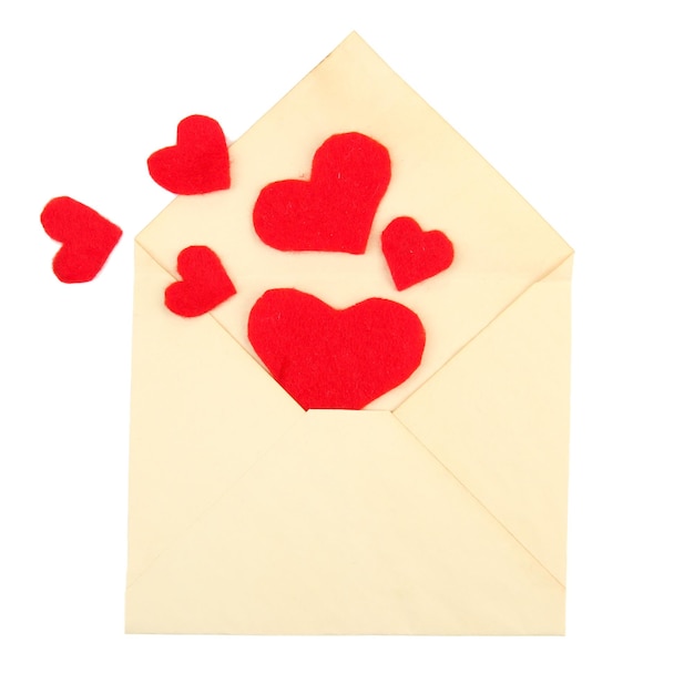 Beautiful old envelope with decorative hearts, isolated on white