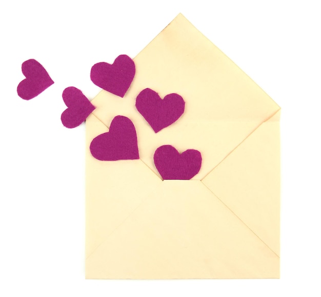 Beautiful old envelope with decorative hearts, isolated on white