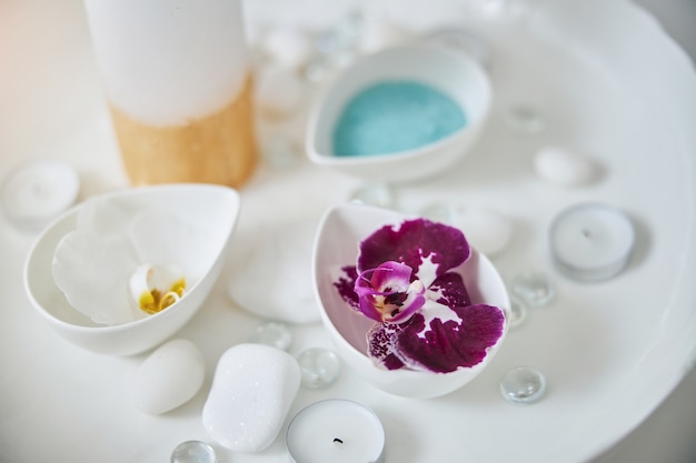 Beautiful orchids and accessories for spa procedure