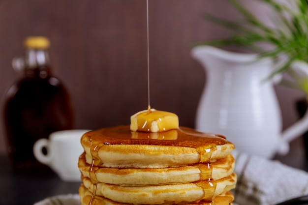 Beautiful pancakes with syrup.