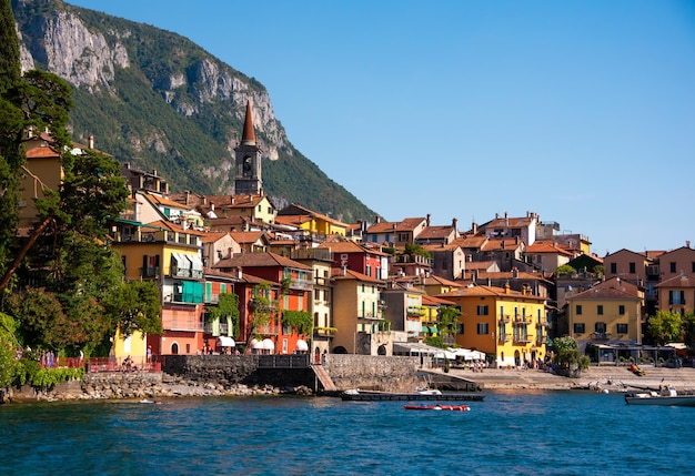 Beautiful panorama of lake Como with a small coastal town famous tourism destination