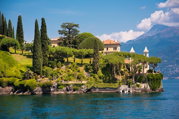 Beautiful panorama of lake Como with a small coastal town famous tourism destination