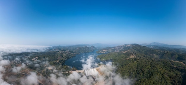 Beautiful panoramic landscape aerial view mae suai dam or reservoir blue sky background at chiang rai Thailand