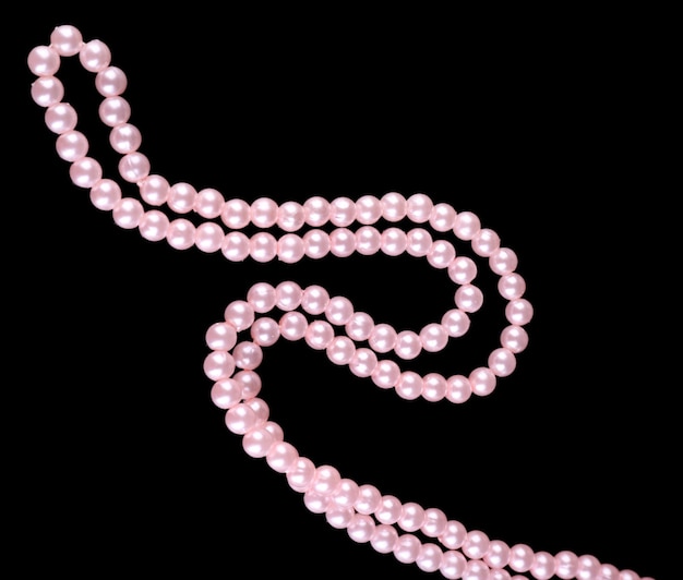 Photo beautiful pearls on black background