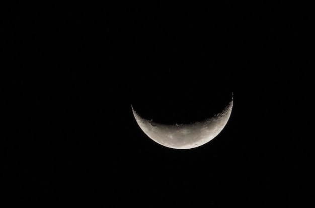 Beautiful photo of the waning moon in close up with dark sky