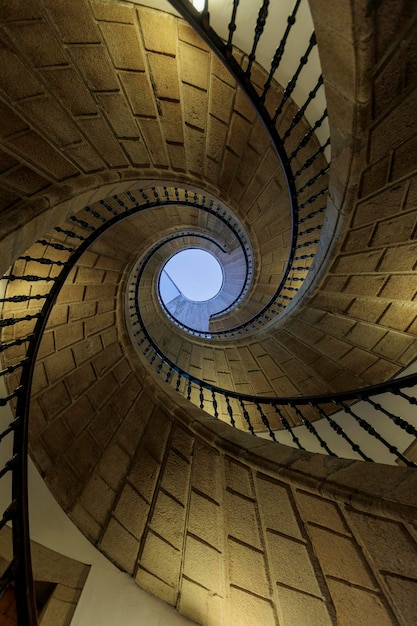 Beautiful photograph of a spiral staircase with no exit