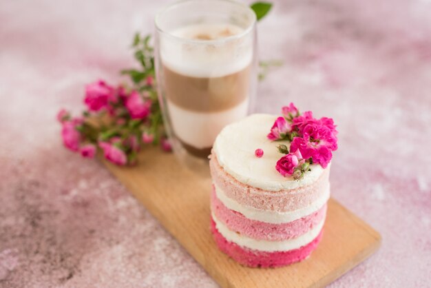 Beautiful pink cream and berries cake 