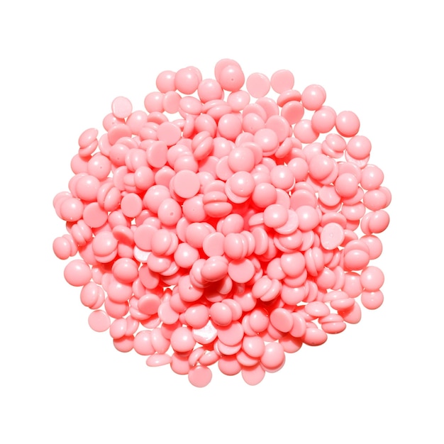 사진 흰색 배경에 있는 아름다운 분홍색 제모 핫 왁스 알갱이 격리 복사 공간 제모 왁스