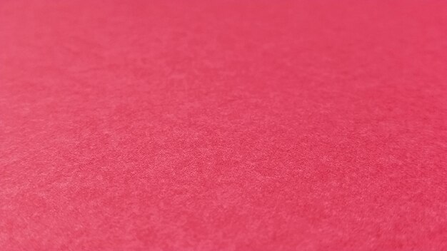 Beautiful pink or fuchsia bright background Scarlet purple uneven color A sheet of colored paper with a soft fleecy texture