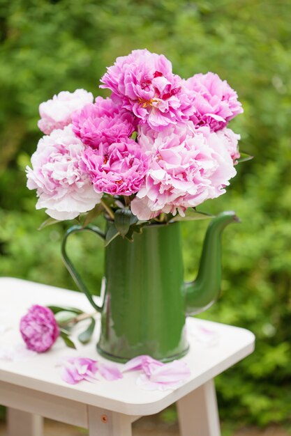 Beautiful pink peony flowers bouquet in garden