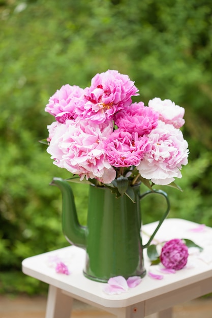 Beautiful pink peony flowers bouquet in garden