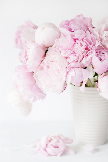 Beautiful pink peony flowers bouquet in vase