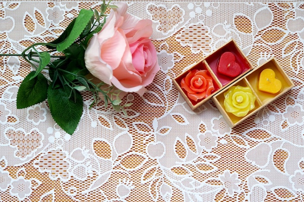 Beautiful pink rose with romantic love heart rose candle for Valentine's day.