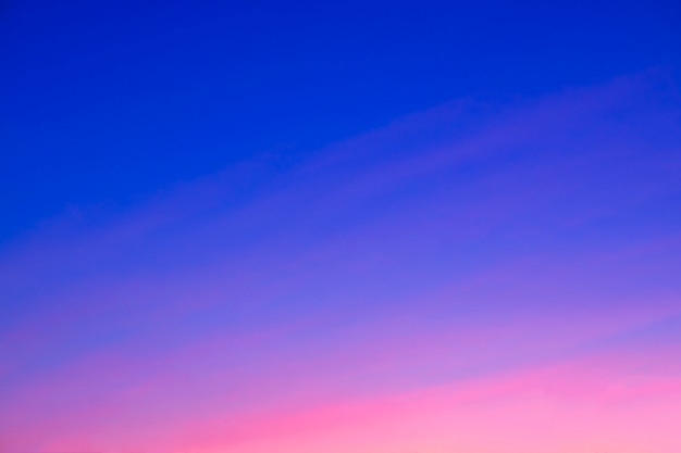 Beautiful pink sunset. For the background. Blue sky