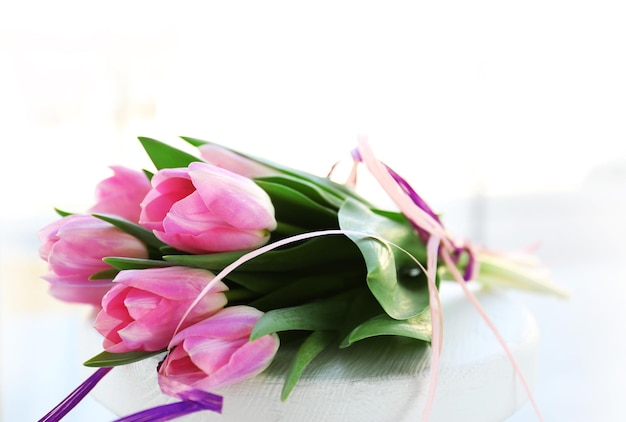 Beautiful pink tulips on a white background