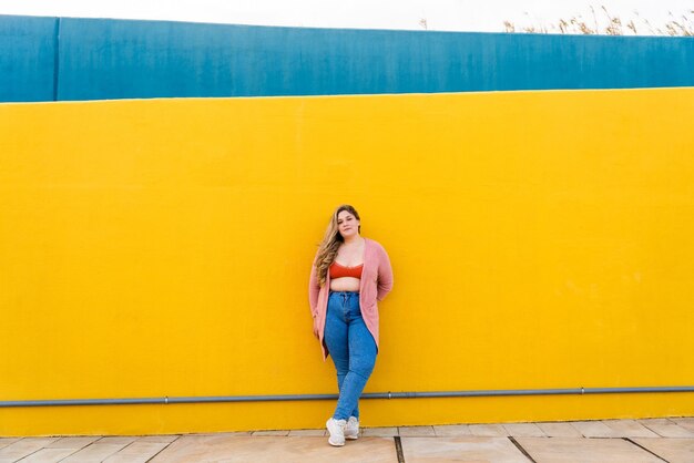 Beautiful plus size young woman outdoors