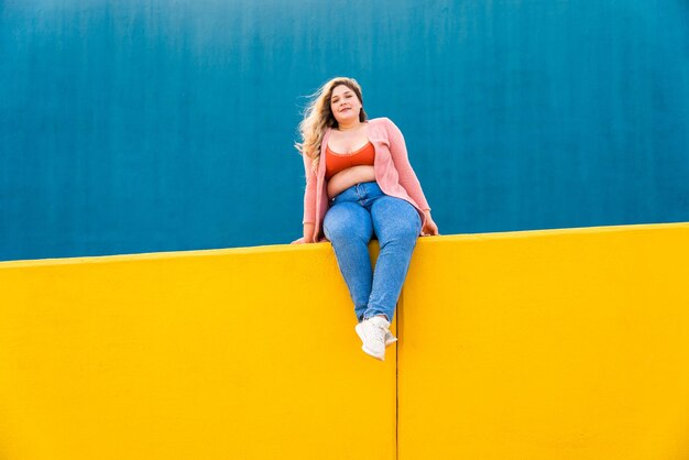 Beautiful plus size young woman outdoors