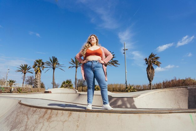 Beautiful plus size young woman outdoors