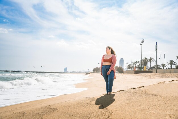 Beautiful plus size young woman outdoors