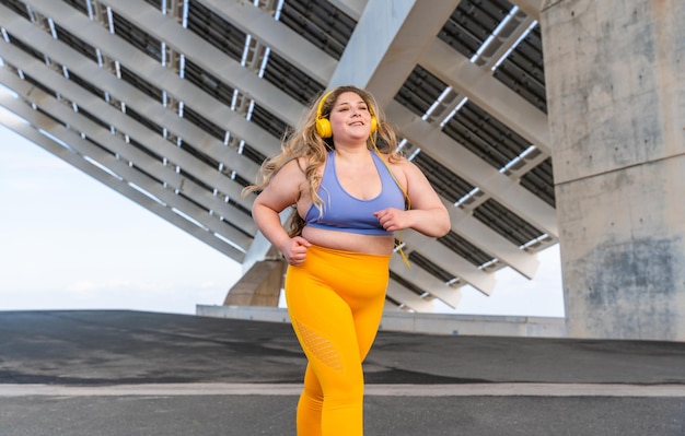 Beautiful plus size young woman outdoors