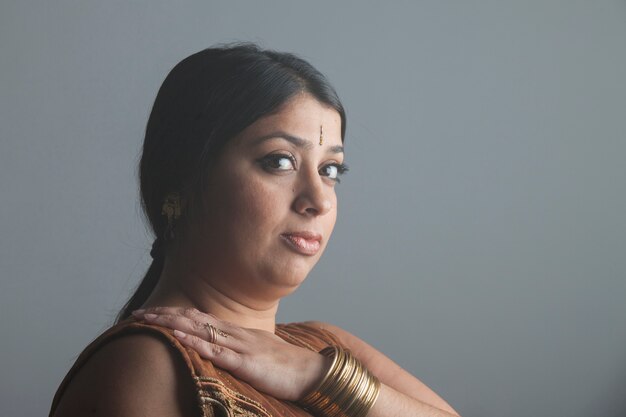 Beautiful portrait of indian woman praying