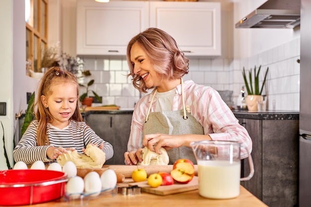 Beautiful portrait of mother and daughter spending time together