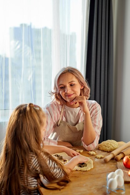 Beautiful portrait of mother and daughter spending time together