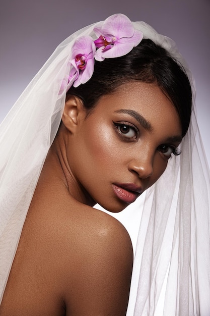 beautiful portrait of a young girl makeup and hairstyle of the bride