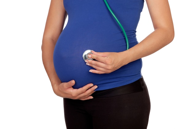 Beautiful pregnant woman with a stethoscope