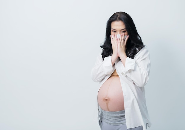 beautiful pregnant women, mother holding baby in pregnant belly