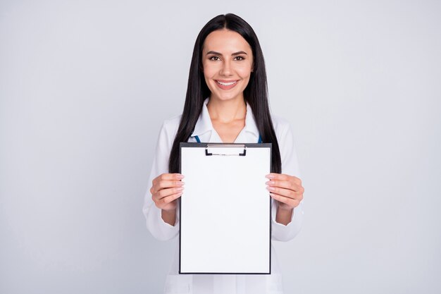 Beautiful professional doc lady in stethoscope white lab coat show clipboard