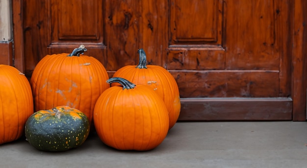 beautiful pumpkins outside a househalloween concept