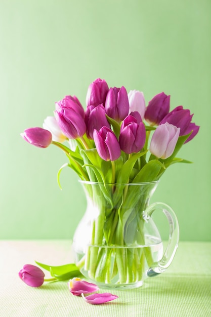 Beautiful purple tulip flowers bouquet in vase