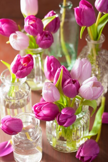 Beautiful purple tulip flowers bouquet in vases