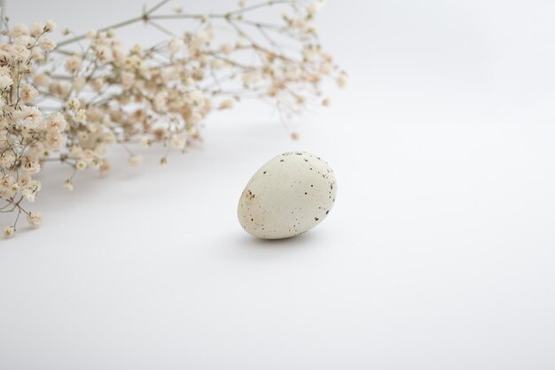 Beautiful quail eggs decorated with flowers and glitter sequins