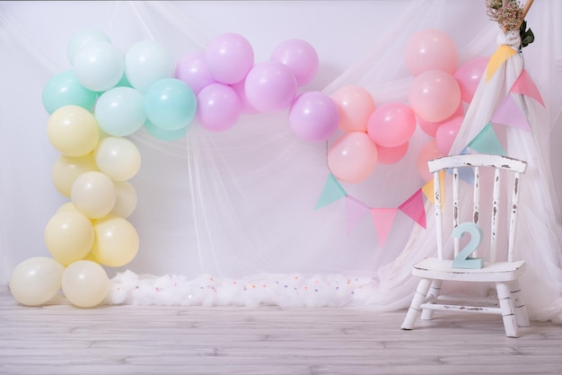 Beautiful rainbow birthday Colorful balloons Girl's birthday Cake smash concept