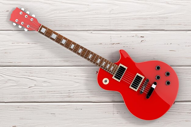 Photo beautiful red electric guitar in retro style on a wooden table. 3d rendering