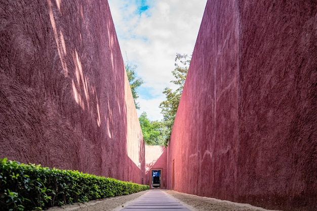 Beautiful red unique walkway wall with abstract texture all around