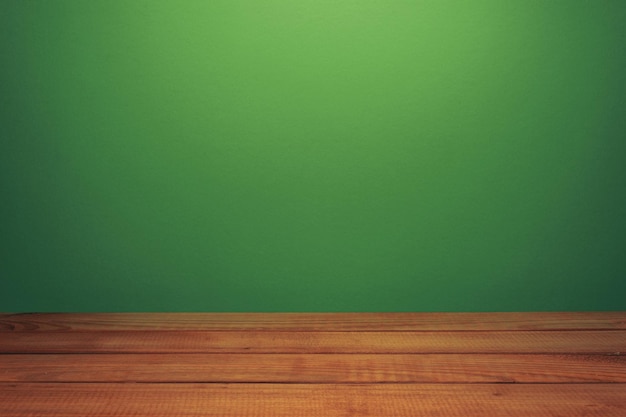 beautiful red wooden table and green wall background