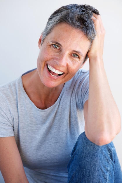 Beautiful relaxed older woman laughing 