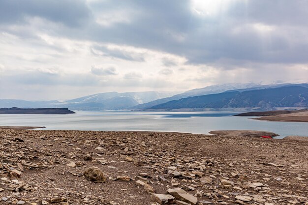 A beautiful reservoir in the mountains Low water level drought and beautiful patterns are visible