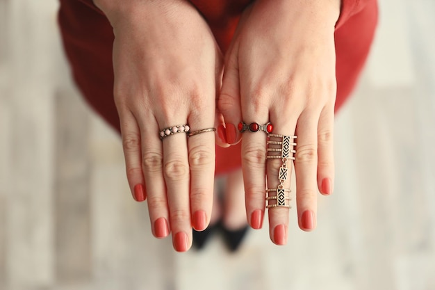 Beautiful rings on female fingers close up