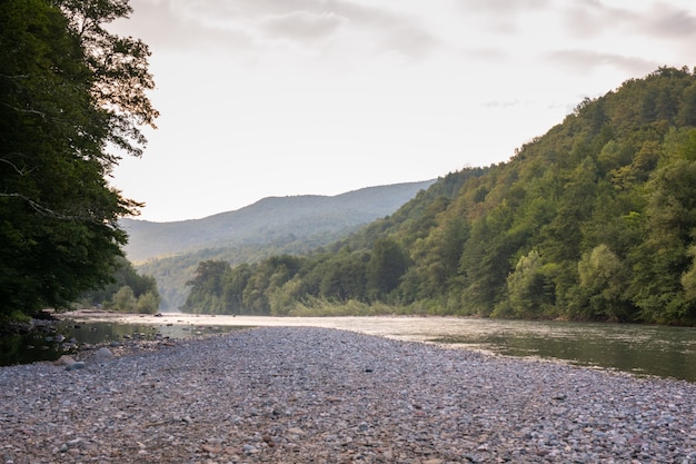 A beautiful river flows between the rocks